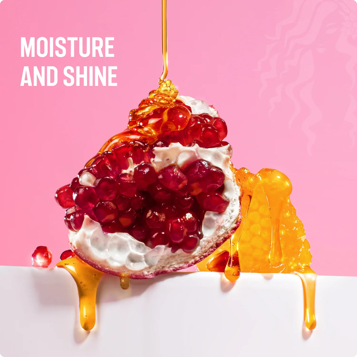 Pomegranate and cream dessert with honey drizzle on a pink background, labeled 'Moisture and Shine'.