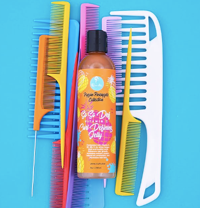 A picture of a child brushing mother hair on mother's day