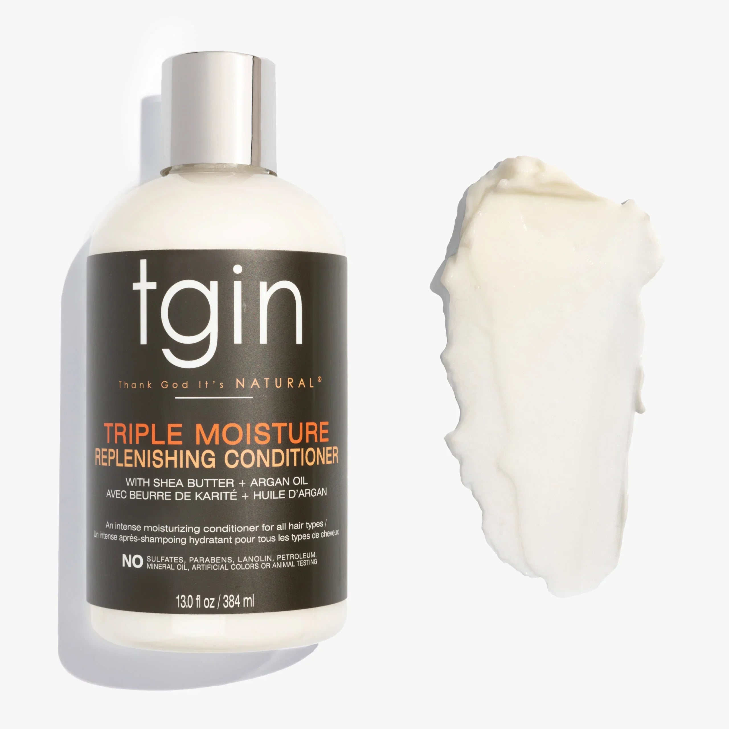 Hair product called TGIN on a white background with a sample of the texture of product beside the product