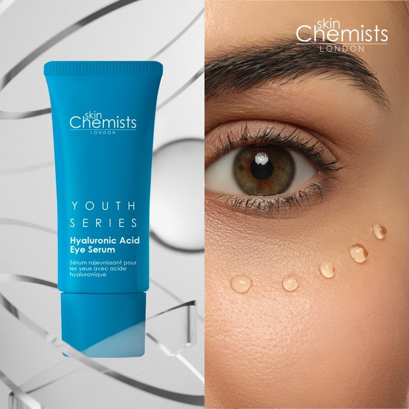 Blue skincare serum tube labeled 'skin Chemists' with a close-up of a person's eye and face.