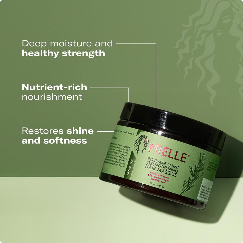 Mielle hair mask jar with green label on a light green background