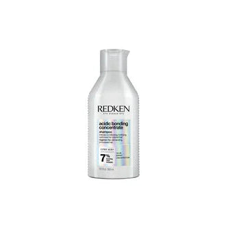 Redken bottle of acidic toning concentrate on a white background
