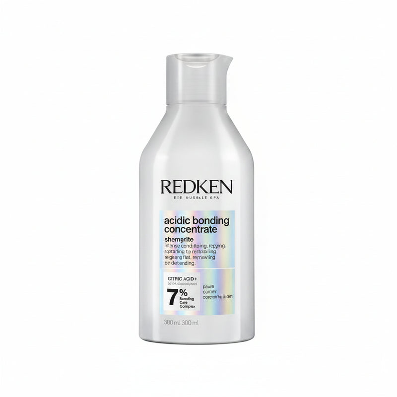 Redken bottle of acidic toning concentrate on a white background