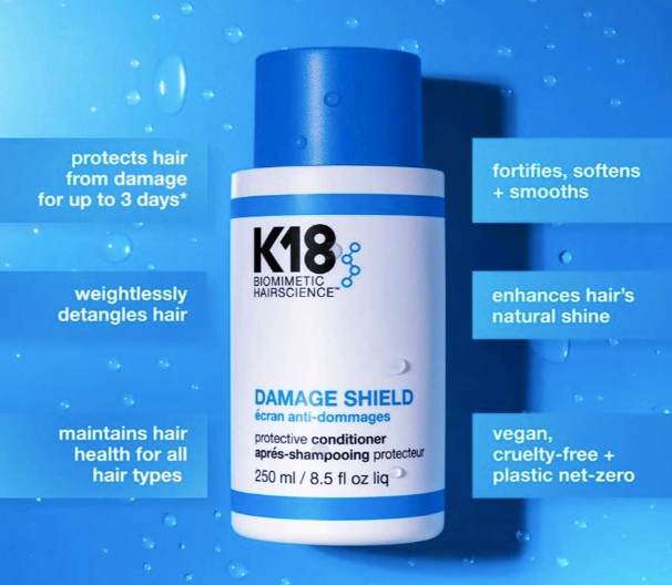 K18 Damage Shield conditioner bottle with blue and white design on a blue background