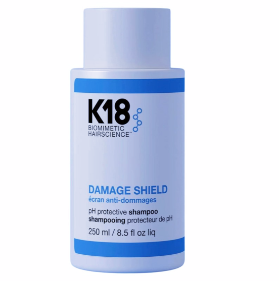 K18 Damage Shield shampoo bottle on a white background