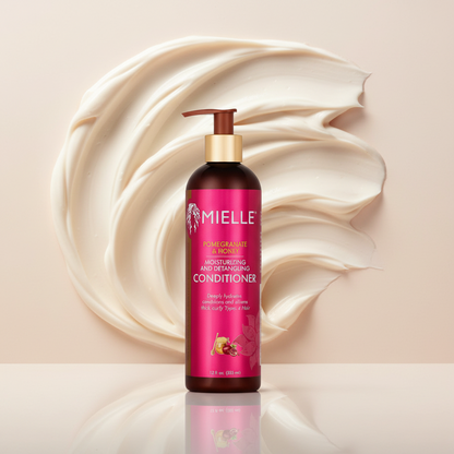 Mielle Pomegranate & Pomegranate Seed Moisturizing and Detangling Conditioner bottle on a white background