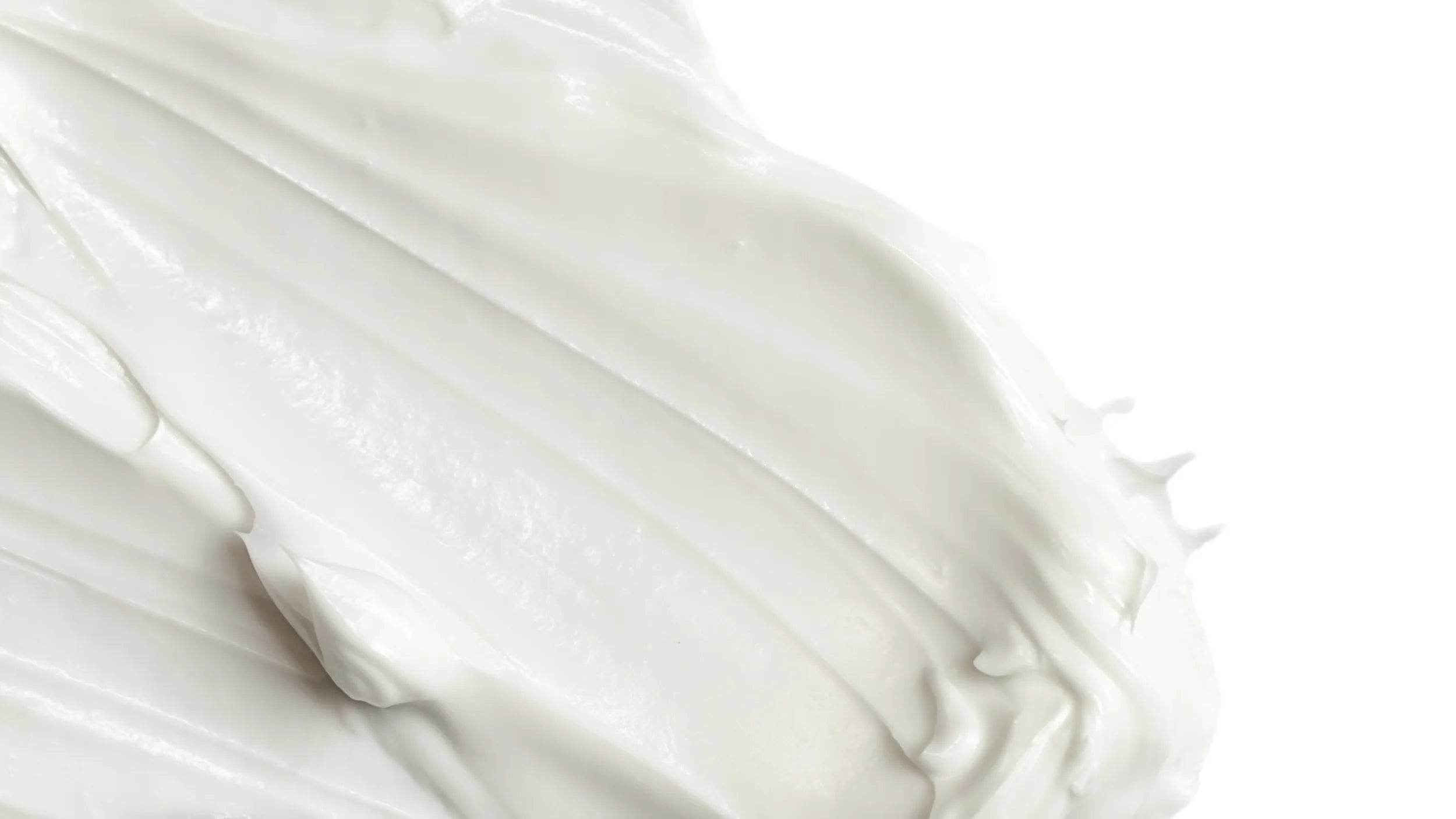 Close-up of white formula with folds on a white background