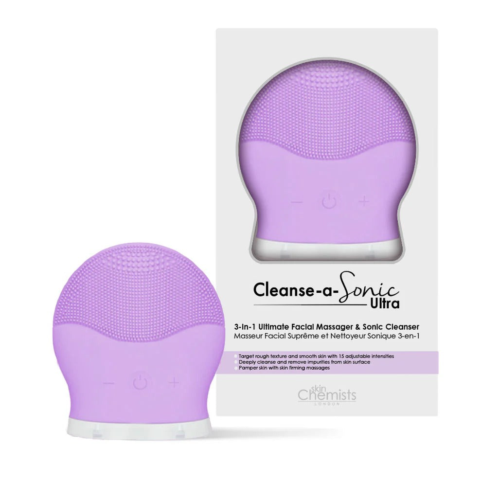 Purple facial cleansing device with packaging on a white background