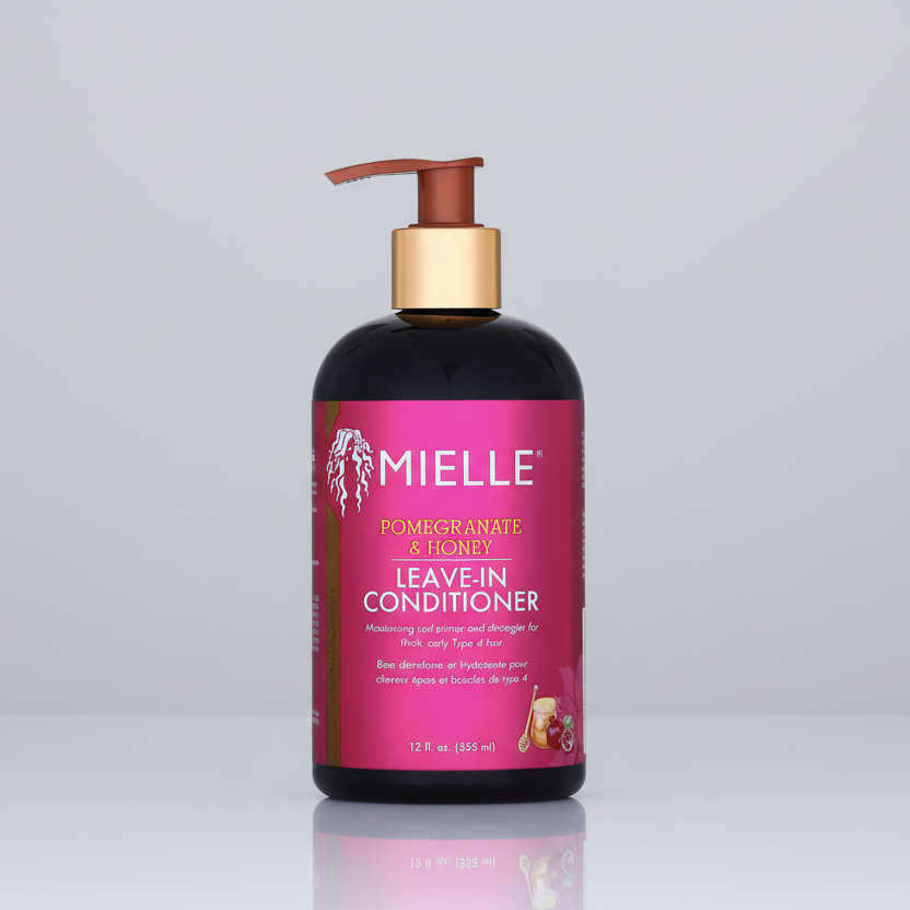 Mielle Pomegranate & Honey Leave-In Conditioner bottle on a white background
