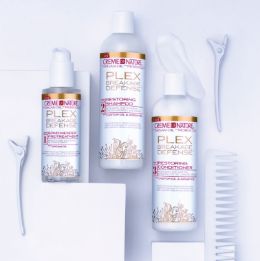 Creme of Nature Plex hair care products on a white background