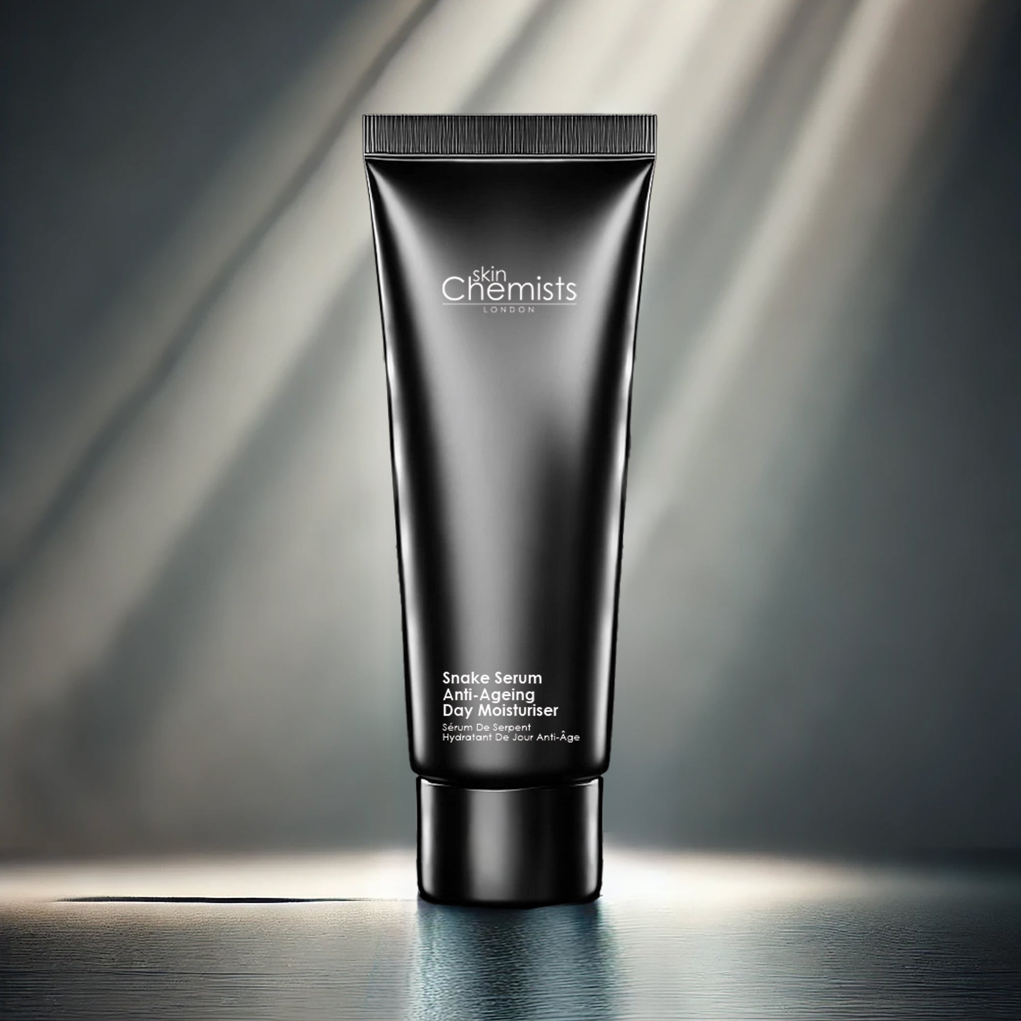 Black skincare tube with 'skinChemists' branding on a gray background