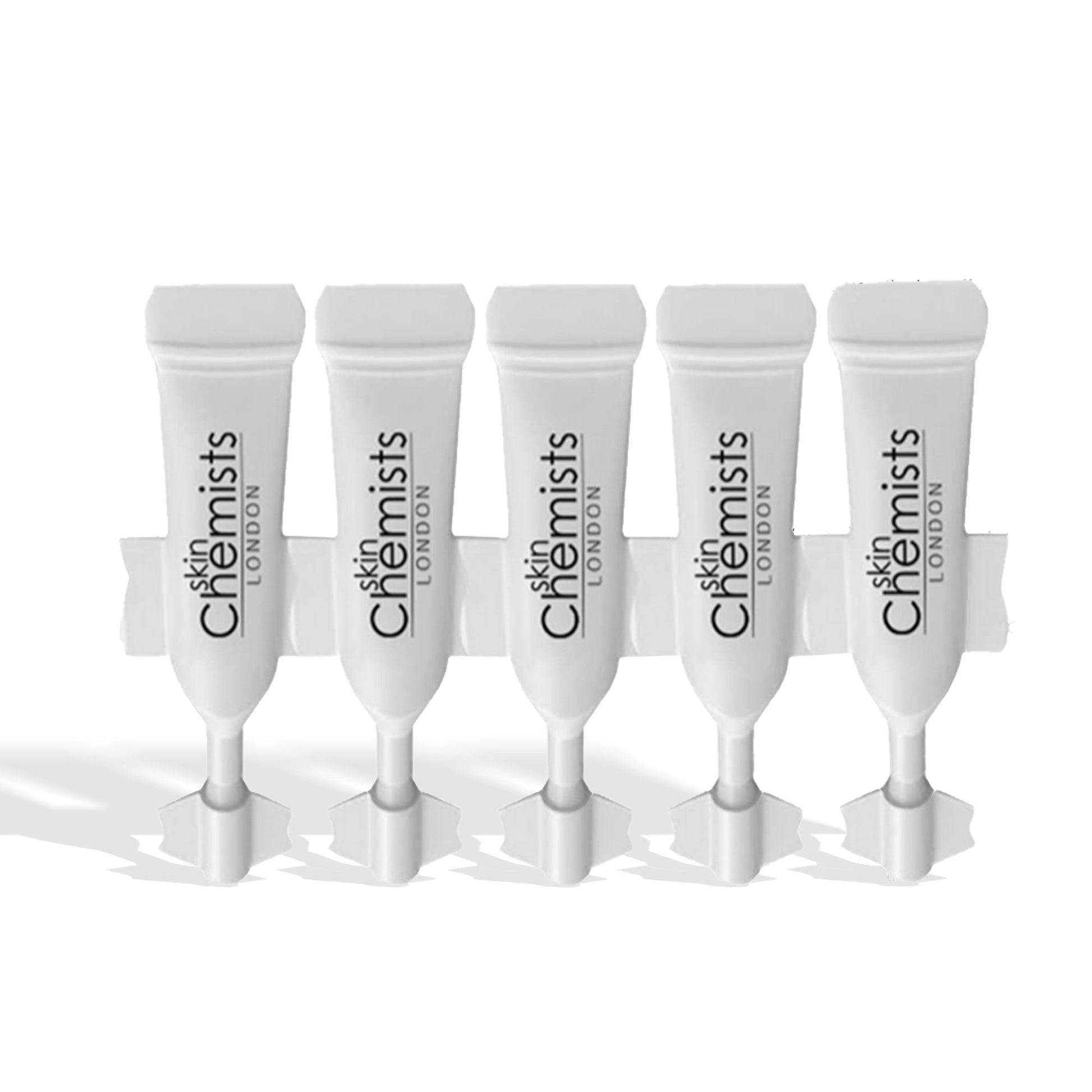 Five white tubes of skinChemists London on a white background