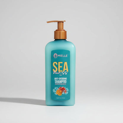 Blue shampoo bottle with brown pump labeled 'Mielle' on a white background